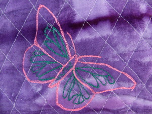 Embroidered Butterfly on purple bag
