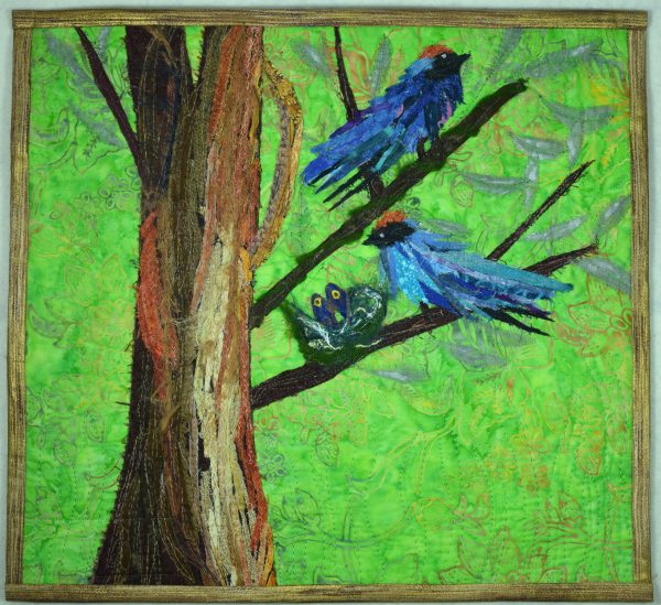 Swallow Family in a Nest art quilt