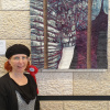 Photo of Caged In with artist and 1st place ribbon